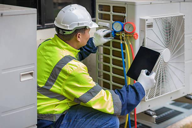 Professional Hvac Maintenance technician working in Garland, UT